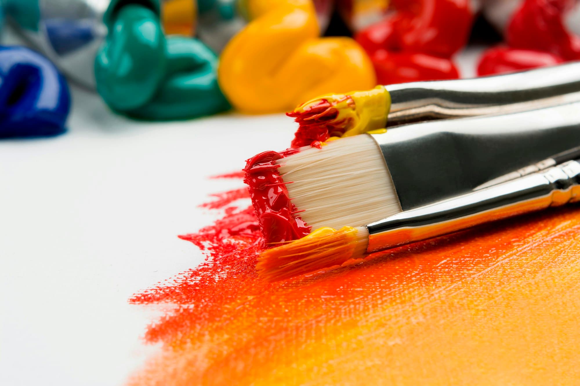 Art supplies and brushes arranged for creative work