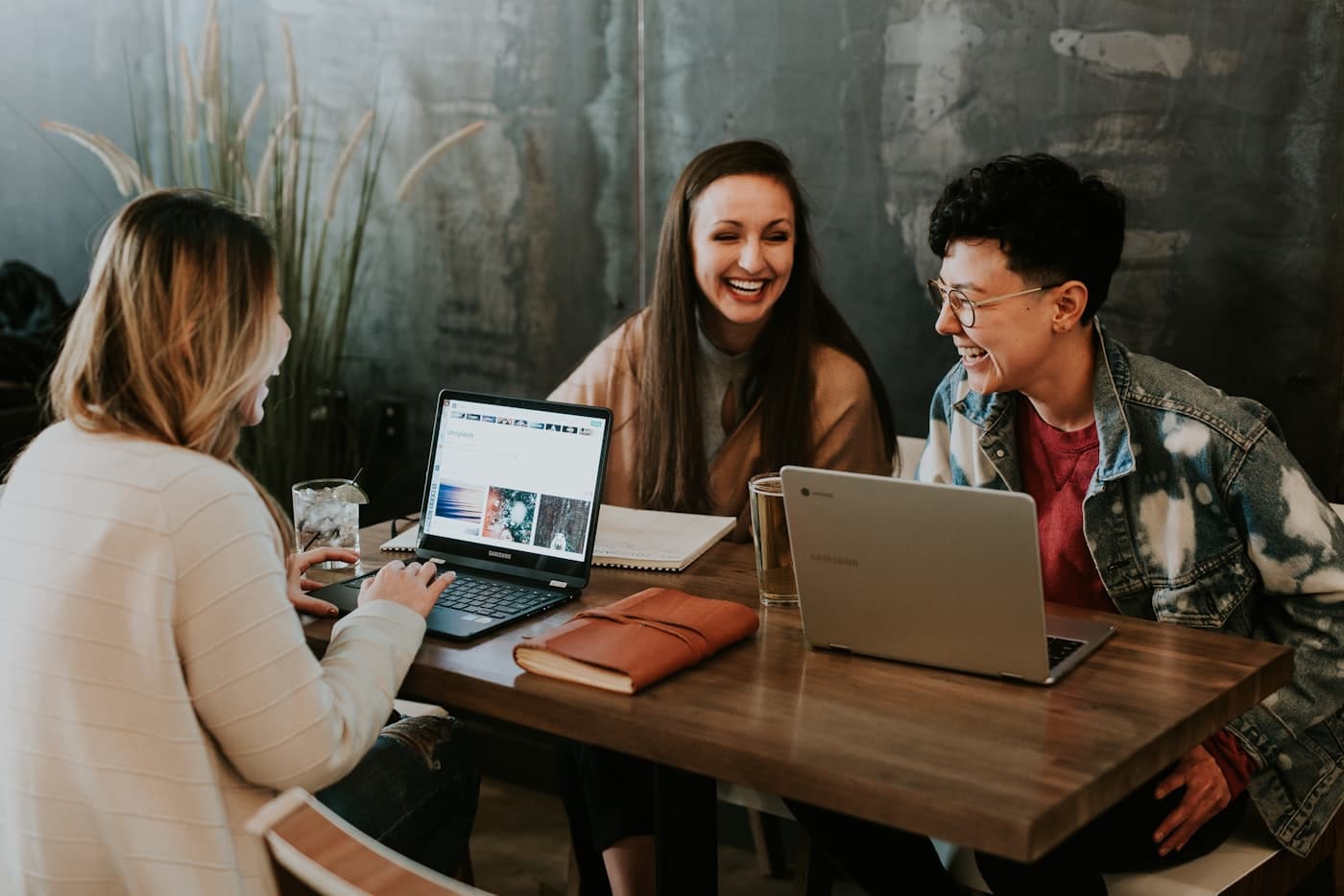People collaborating and learning together at a table